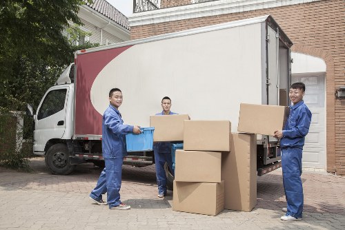 Removal team sorting recyclable moving materials in Crystal Palace