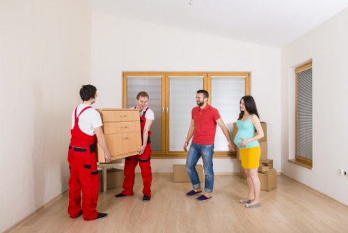 Packed moving boxes with a damage note and inventory list