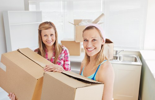 Packing and moving office furniture during a local relocation